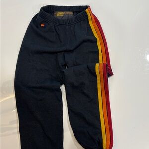 Avaitor Nation Kids Charcoal Joggers with Red and Yellow Stripes